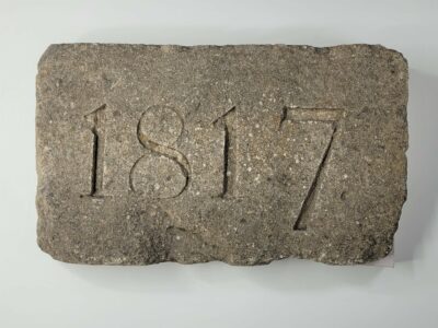 rectangle of stone with the date 1817 carved into it