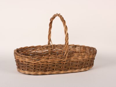 A photograph of a wicker flower basket